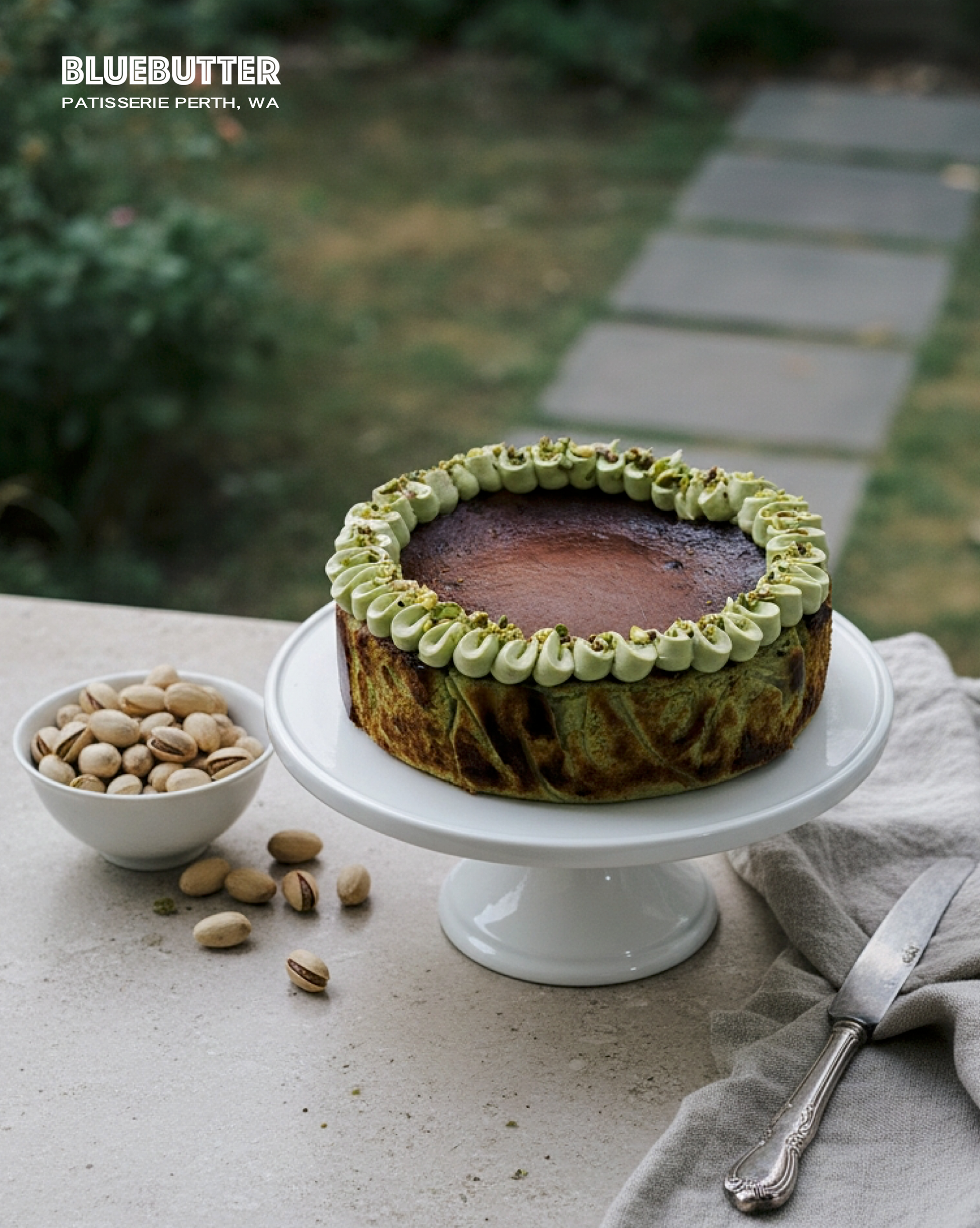 Cross-section of a dense and creamy Pistachio Basque Cheesecake showing its rich green centre and signature caramelised top.