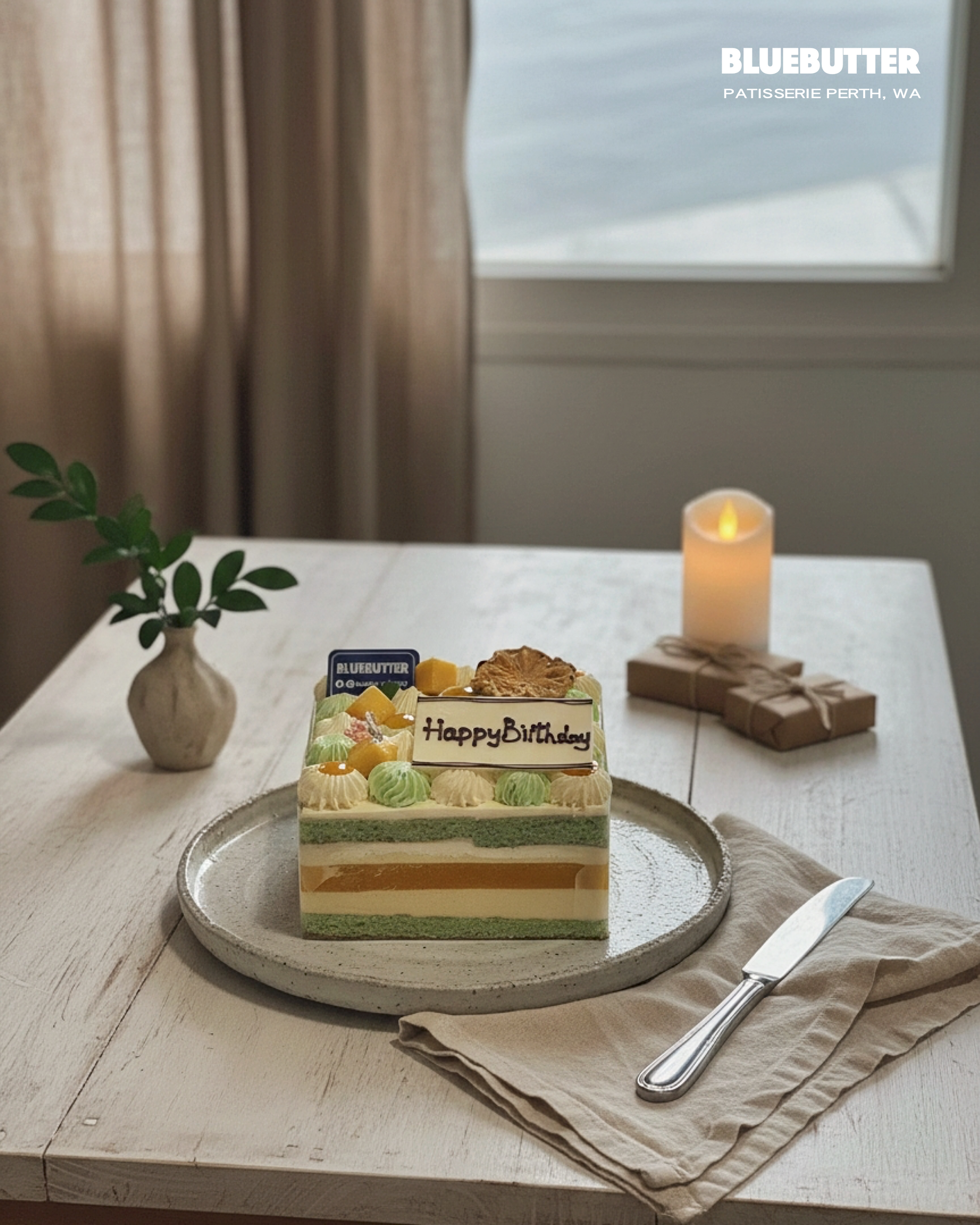 A beautifully crafted gluten-free Mango and Pandan Layer Cake, featuring vibrant tropical fruit layers, by BLUEBUTTER Patisserie in Perth.