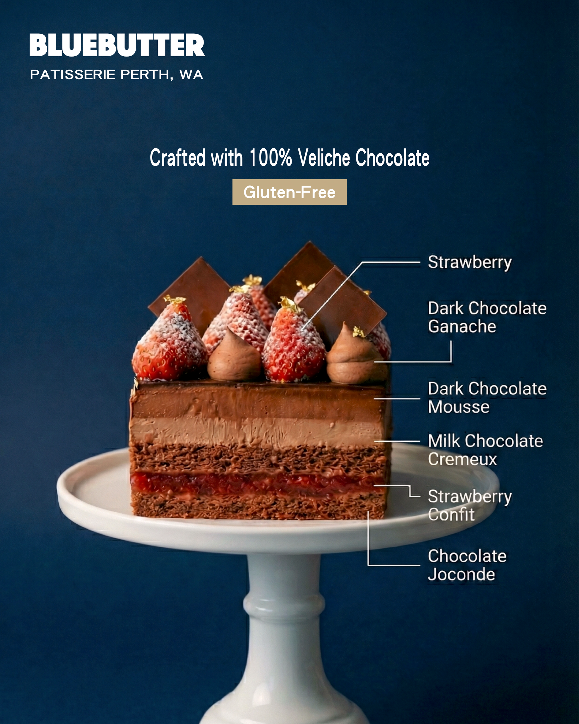 Cross-section showing layers of Veliche dark chocolate mousse, milk chocolate mousse, and a bright strawberry confit centre.