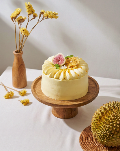 A premium nut-free Durian Shortcake layered with smooth durian filling and light sponge cake, handcrafted by BLUEBUTTER Patisserie in Perth.