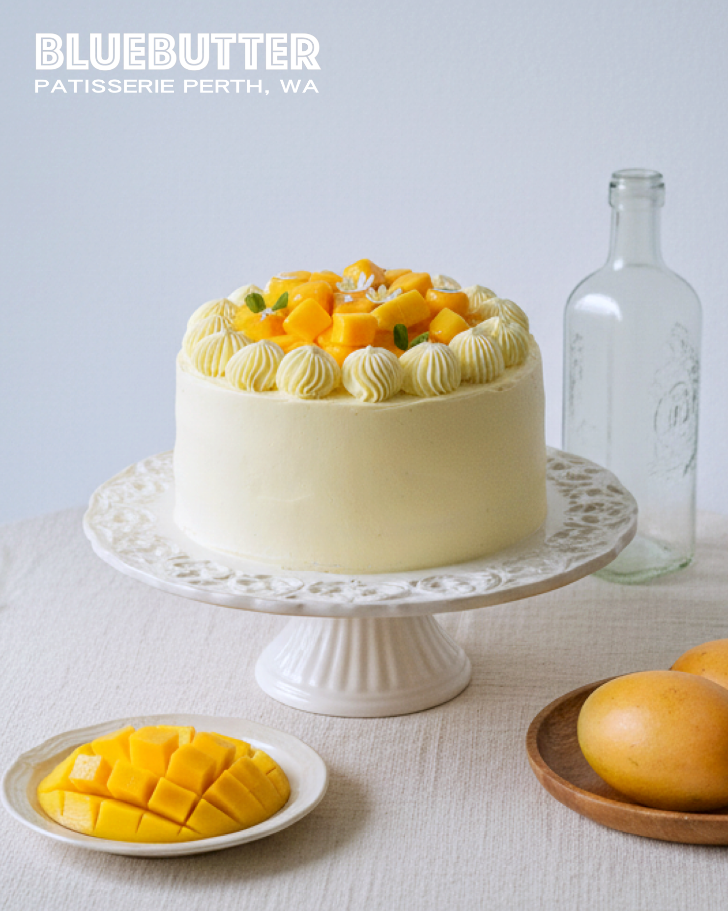 Cross-section of a fluffy Mango Shortcake showing layers of soft sponge and silky mango cream.